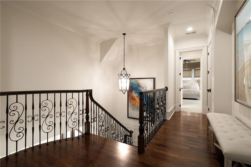 4136 North Stratford Road Northeast Atlanta, GA 30342 - Photo 32 of 78 a view of hallway with wooden floor