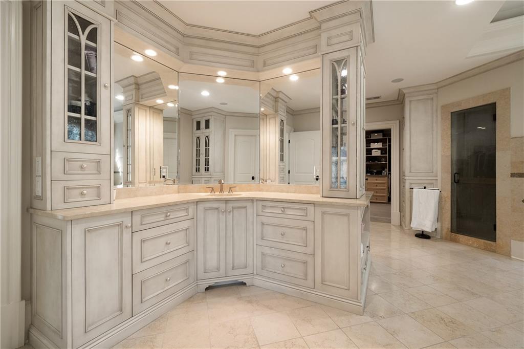 4136 North Stratford Road Northeast Atlanta, GA 30342 - Photo 36 of 78 a spacious bathroom with a granite countertop sink mirror and a