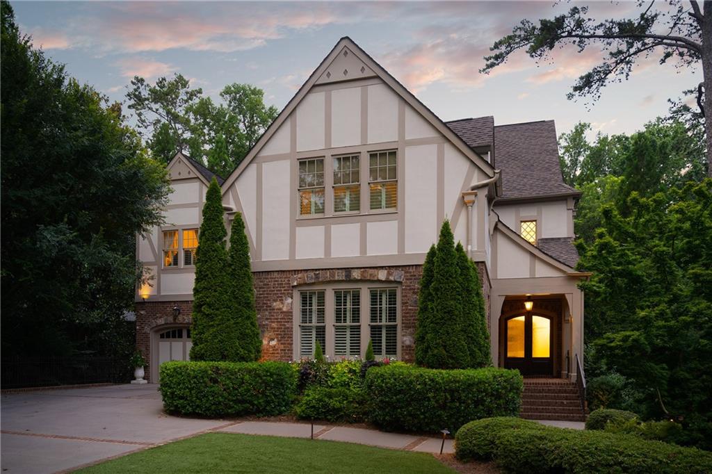 4136 North Stratford Road Northeast Atlanta, GA 30342 - Photo 4 of 78 front view of a house with a yard