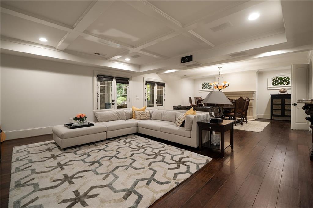 4136 North Stratford Road Northeast Atlanta, GA 30342 - Photo 50 of 78 a living room with furniture and wooden floor