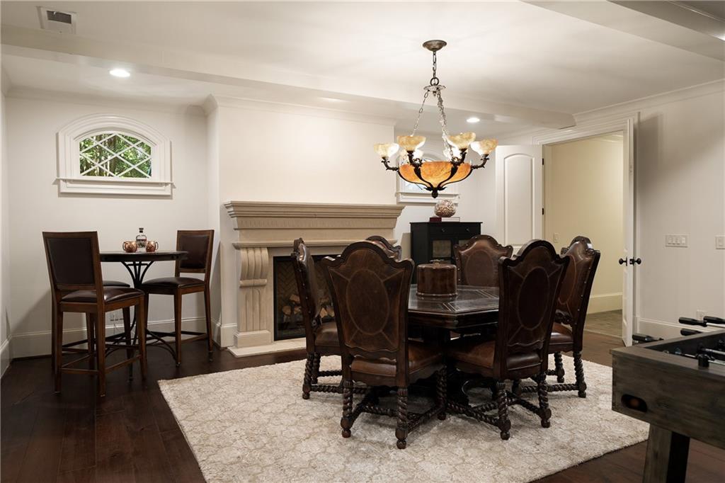 4136 North Stratford Road Northeast Atlanta, GA 30342 - Photo 55 of 78 a view of a dining room with furniture window and wooden floor