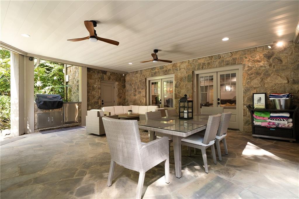 4136 North Stratford Road Northeast Atlanta, GA 30342 - Photo 64 of 78 a view of a dining room with furniture window and outside view