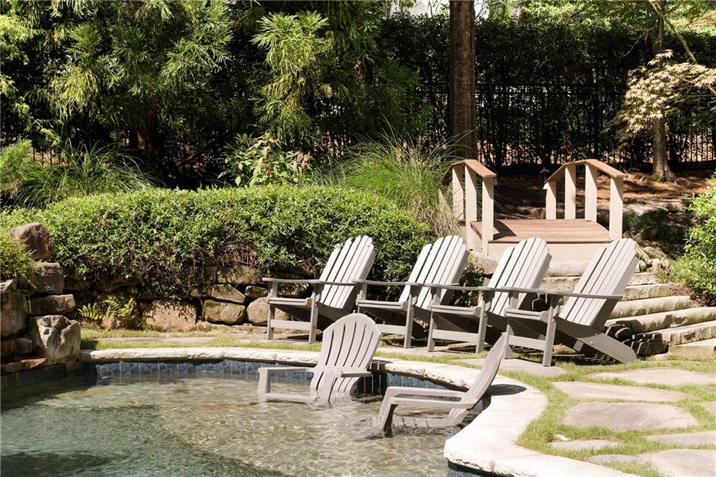 4136 North Stratford Road Northeast Atlanta, GA 30342 - Photo 69 of 78 a view of backyard with swimming pool and outdoor seating