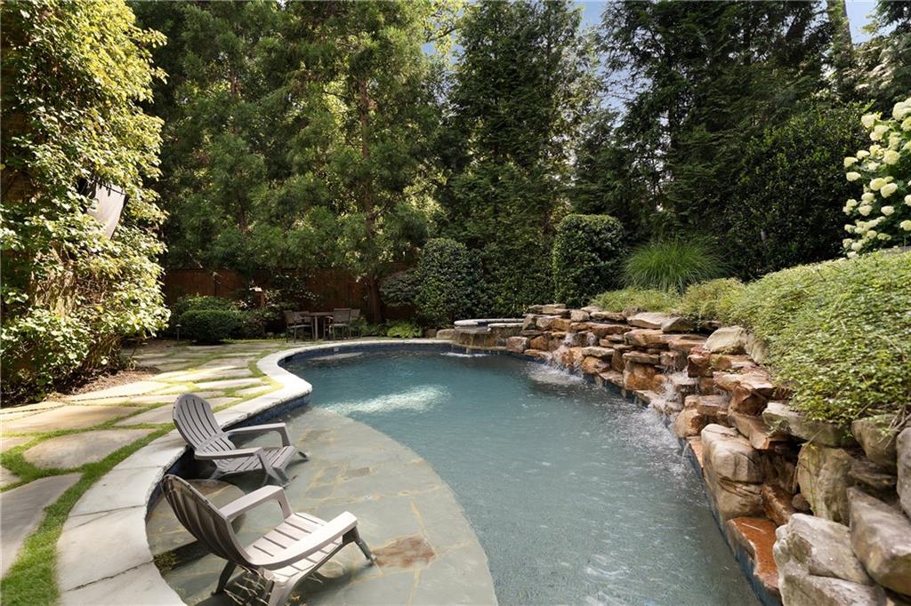 4136 North Stratford Road Northeast Atlanta, GA 30342 - Photo 70 of 78 a view of swimming pool from a lounge chair