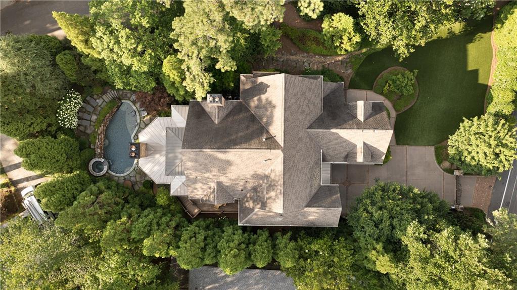 4136 North Stratford Road Northeast Atlanta, GA 30342 - Photo 76 of 78 an aerial view of a house with a yard basket ball court and outdoor seating