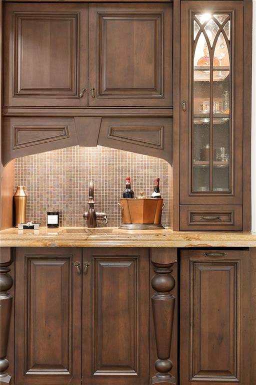 4136 North Stratford Road Northeast Atlanta, GA 30342 - Photo 8 of 78 a kitchen with granite countertop stainless steel appliances sink and cabinets