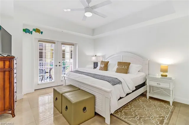 a bedroom with a bed and a cabinets