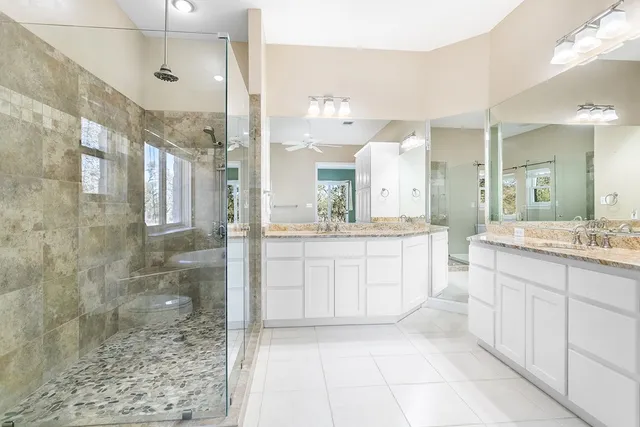 a white bath tub sitting in a bathroom