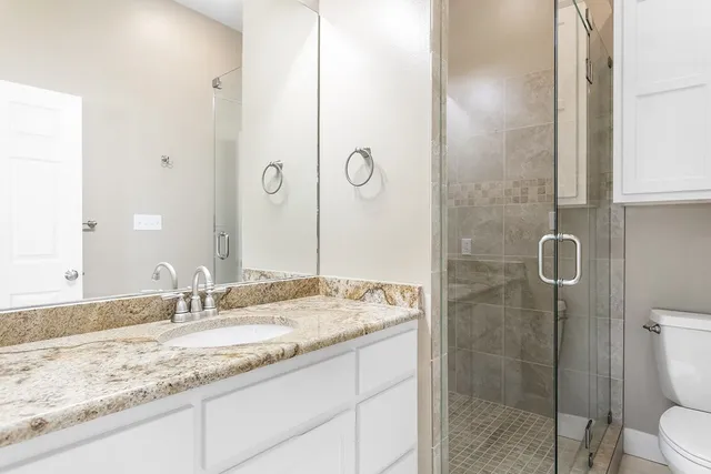 a view of a kitchen with sink washer and dryer
