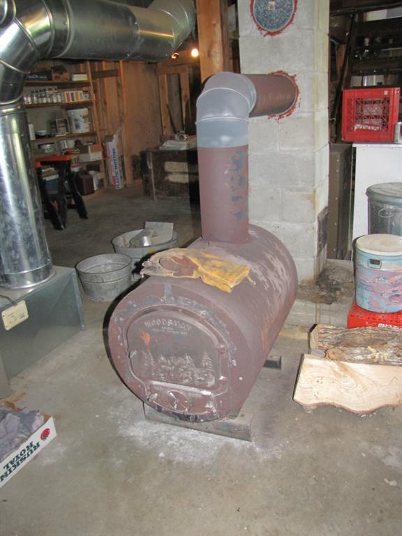 79 Jackson Road Monroe, ME 04951 - Photo 27 of 35 Furnace , to the far left, and wood...