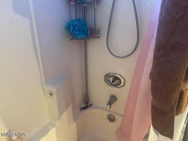 13828 Lear Boulevard Reno, NV 89506 - Photo 3 of 5 a bathroom with a tub