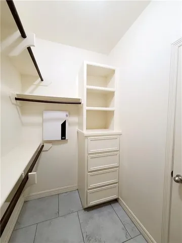 a view of an empty walk in closet