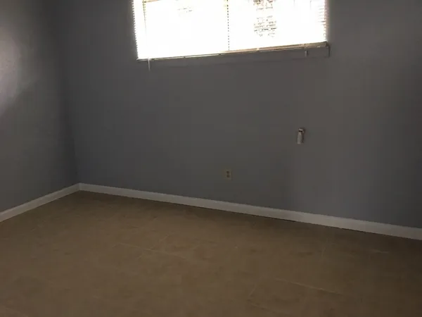 a view of a window in an empty room