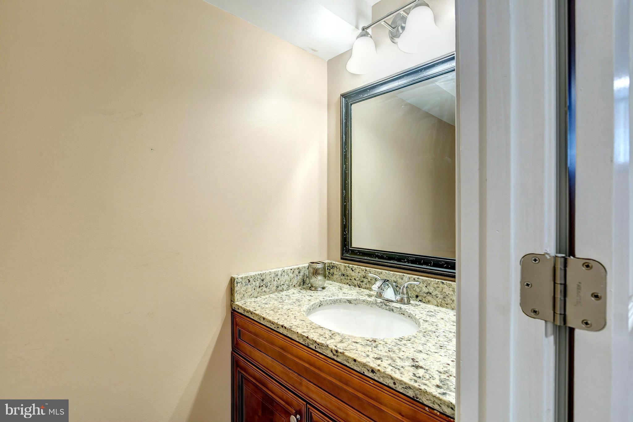 3504 Keston Road Baltimore, MD 21207 - Photo 26 of 30 Convenient Lower Level Powder Room