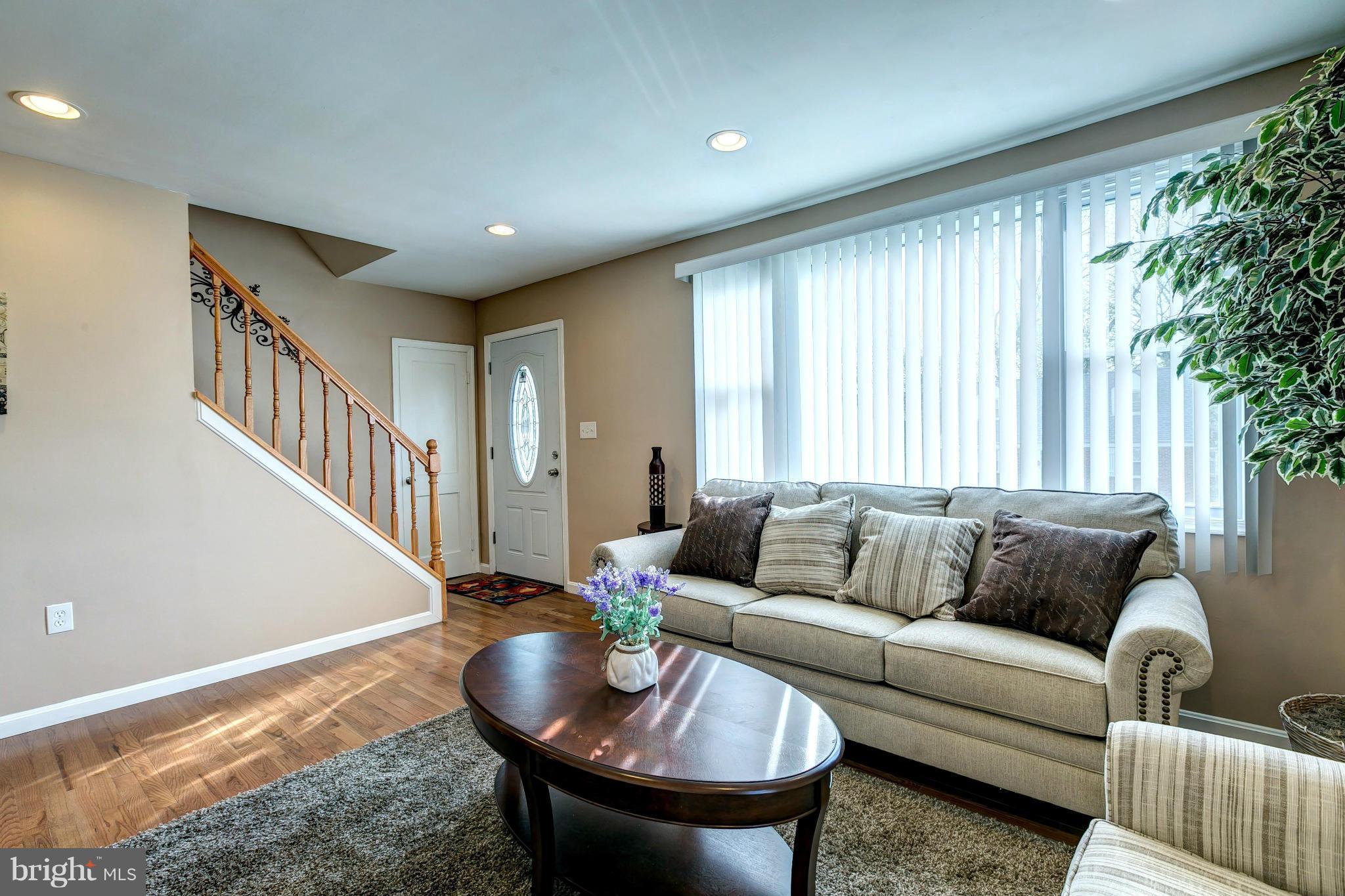 3504 Keston Road Baltimore, MD 21207 - Photo 5 of 30 Large Windows Fill The Room With Sunlight