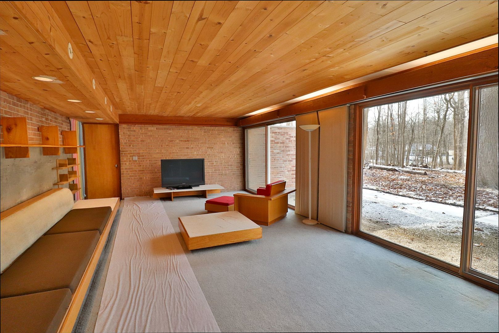 20120 West Brightway Road Mokena, IL 60448 - Photo 11 of 32 a living room with furniture a flat screen tv and floor to ceiling window