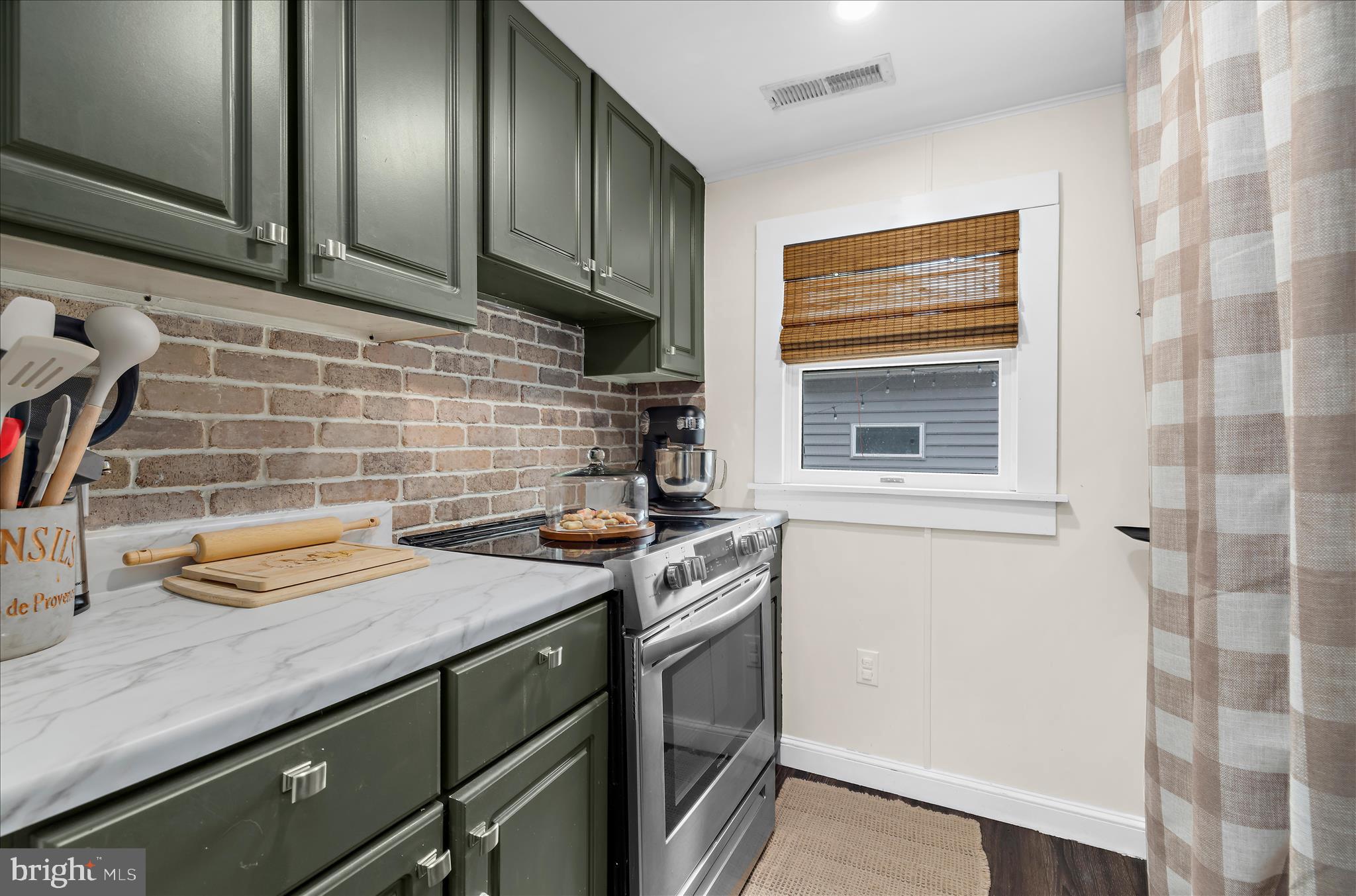 11994 Cordova Road Cordova, MD 21625 - Photo 21 of 57 a kitchen with a sink and cabinets
