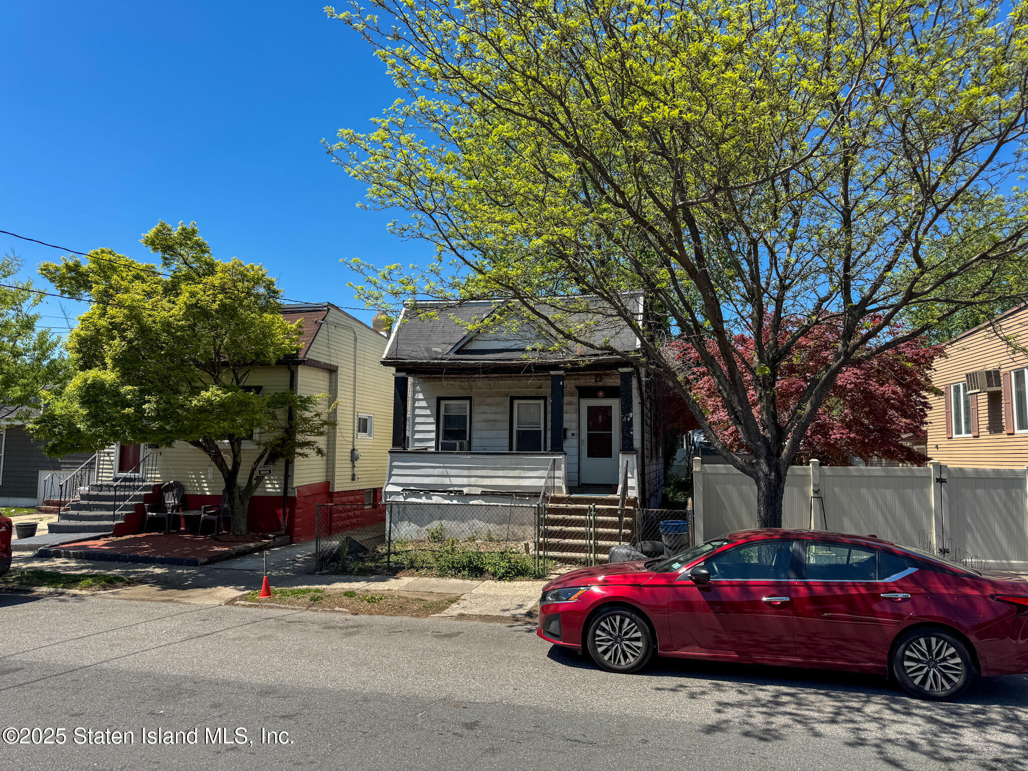 14 Van Riper Street Staten Island, NY 10302 - Photo 2 of 11 a car parked in front of a building