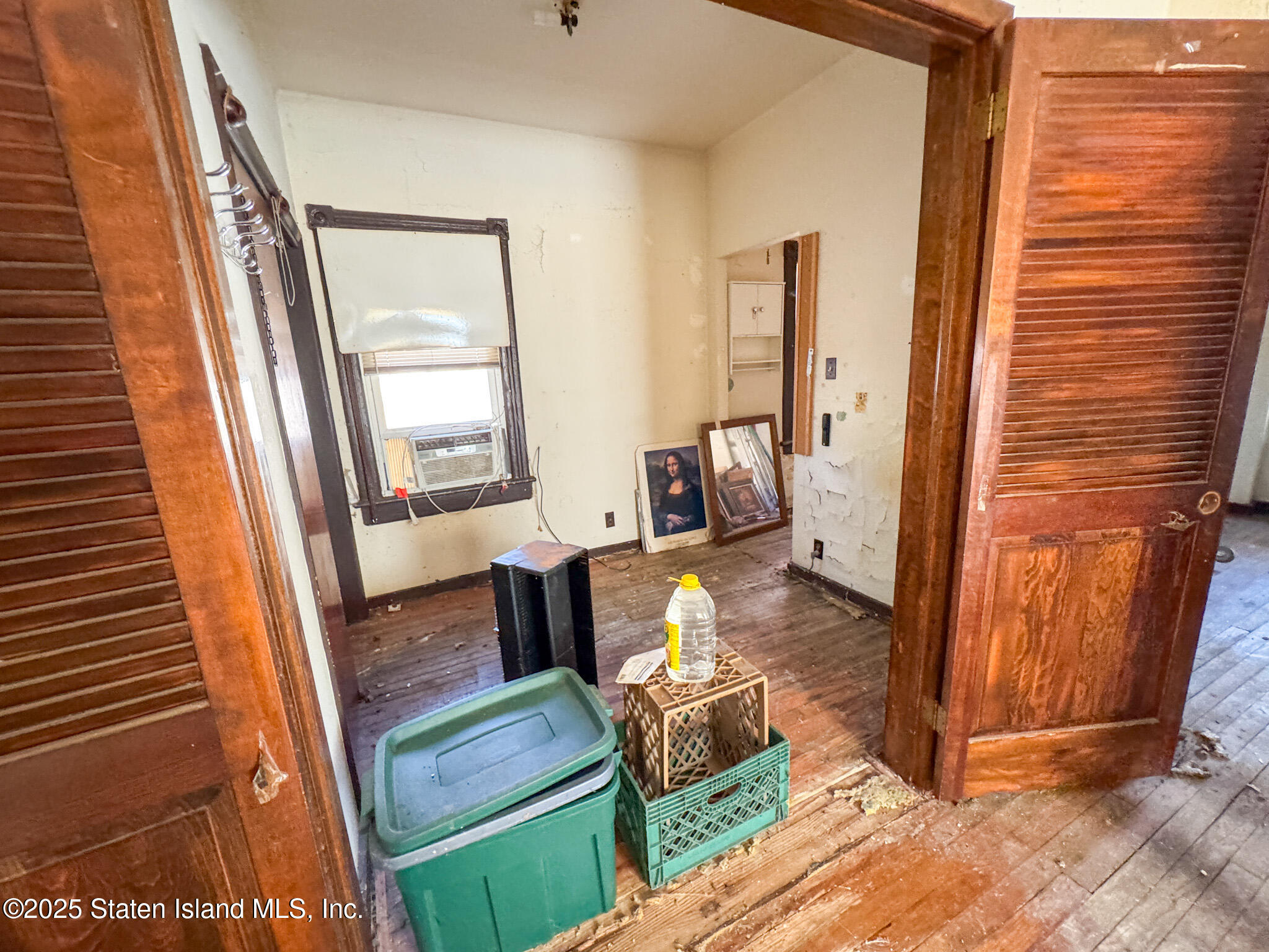 14 Van Riper Street Staten Island, NY 10302 - Photo 8 of 11 a living room with furniture and a fireplace