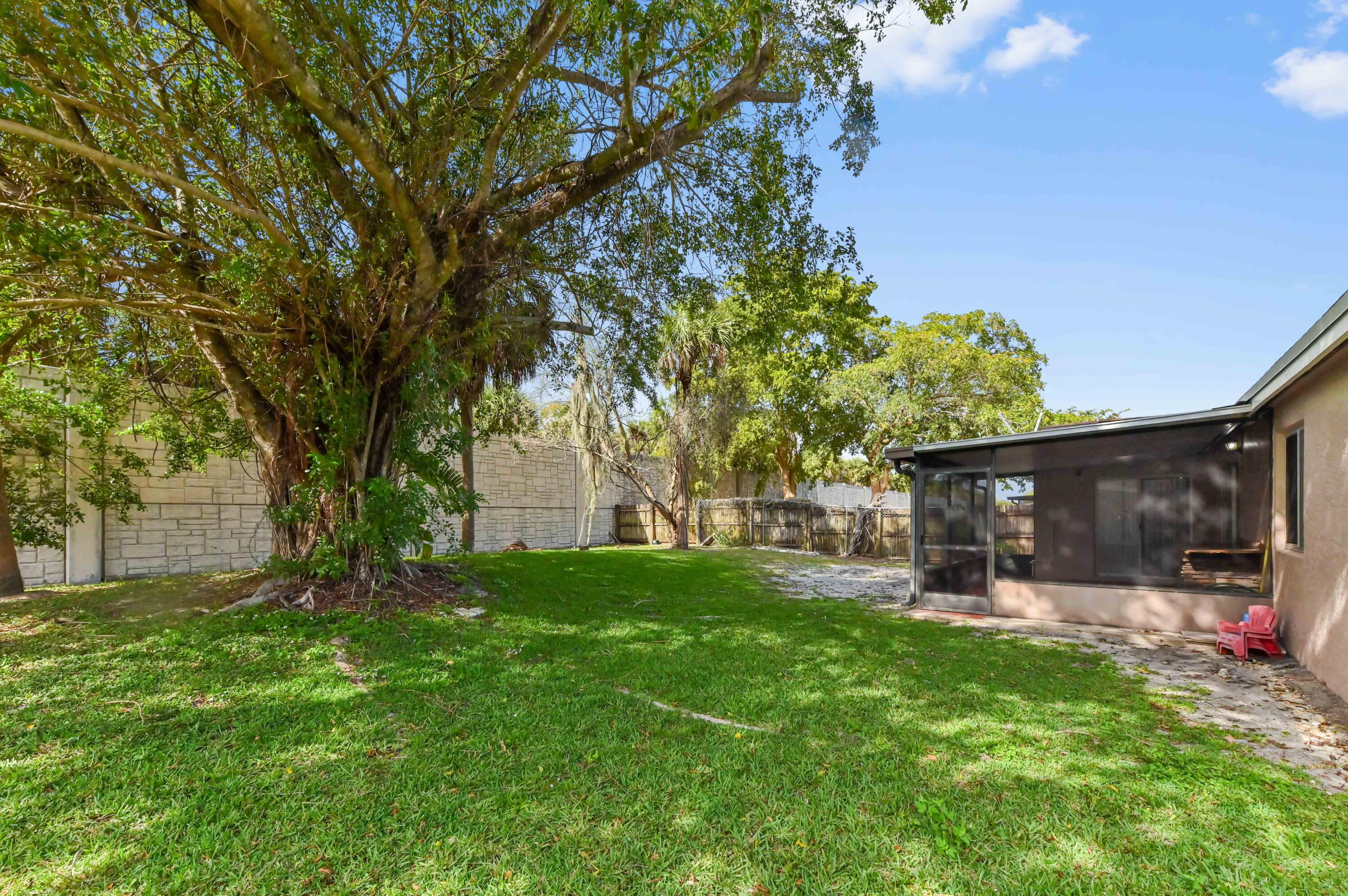 9969 Robins Nest Road Boca Raton, FL 33496 - Photo 34 of 34 34 Rear 01