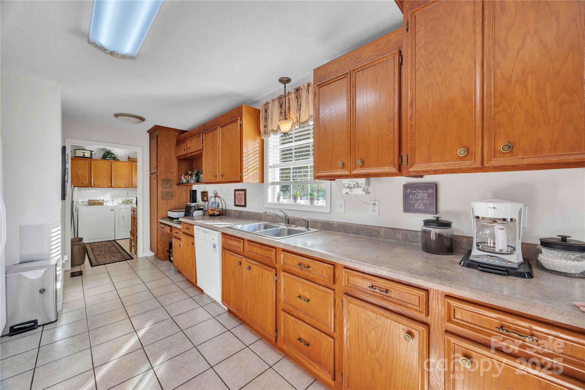 57 Riverview Road Taylorsville, NC 28681 - Photo 15 of 30 a kitchen with stainless steel appliances granite countertop a sink and cabinets
