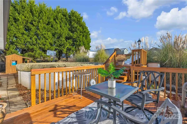 a view of a balcony with chairs