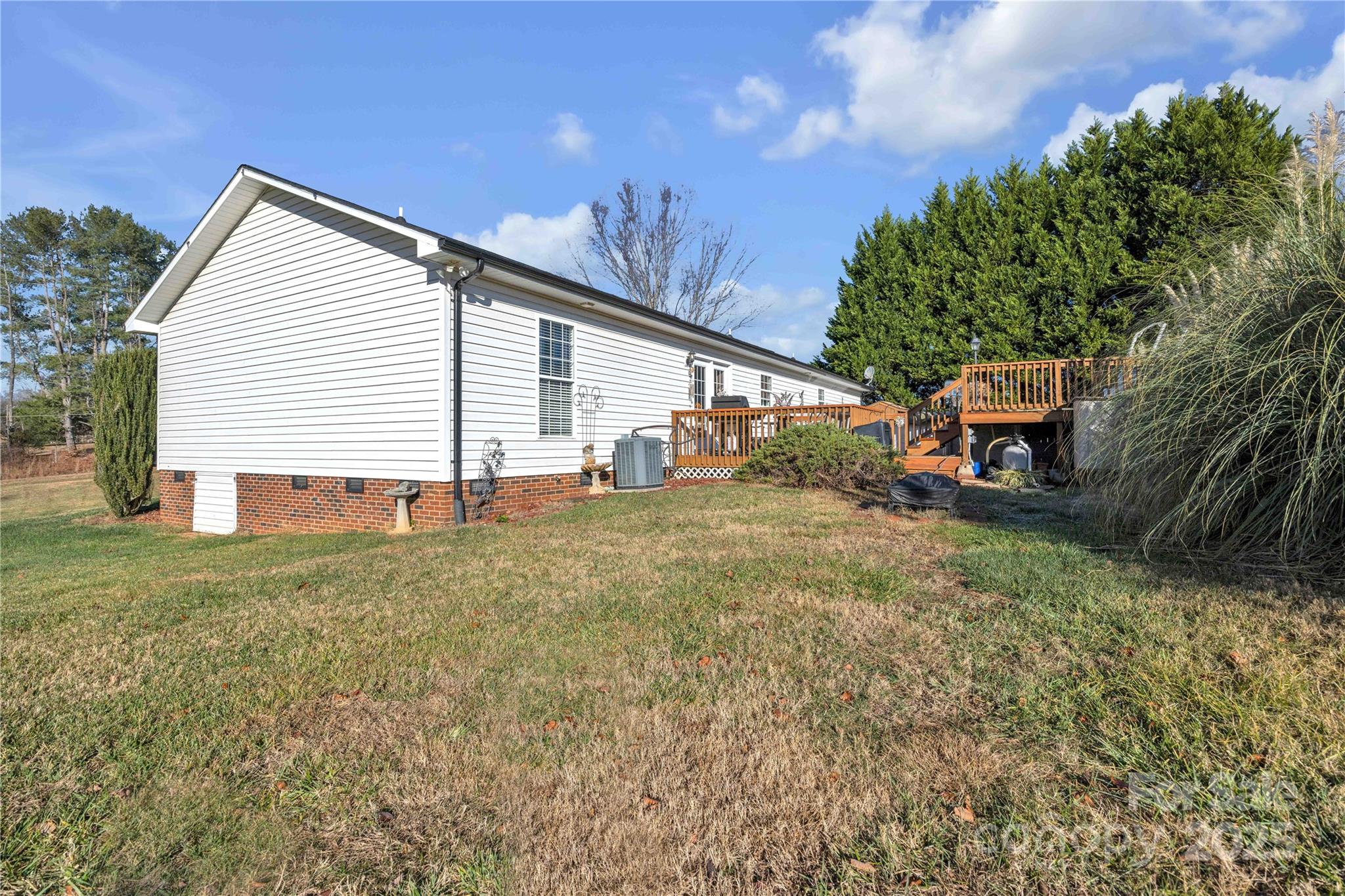 57 Riverview Road Taylorsville, NC 28681 - Photo 30 of 30 a view of a house with a yard