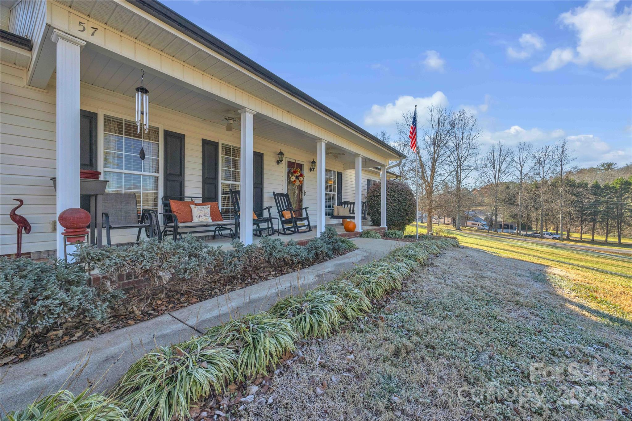 57 Riverview Road Taylorsville, NC 28681 - Photo 4 of 30 a view of a house with backyard and sitting area