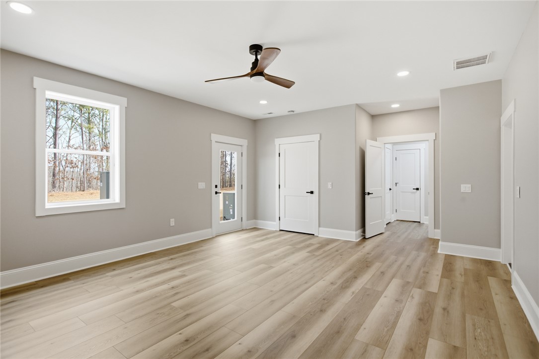 147 McAlister Road West Union, SC 29696 - Photo 27 of 49 This bright room features durable flooring and ample natural light, ideal for comfortable livingCan be mudroom, office, extra sleeping room.