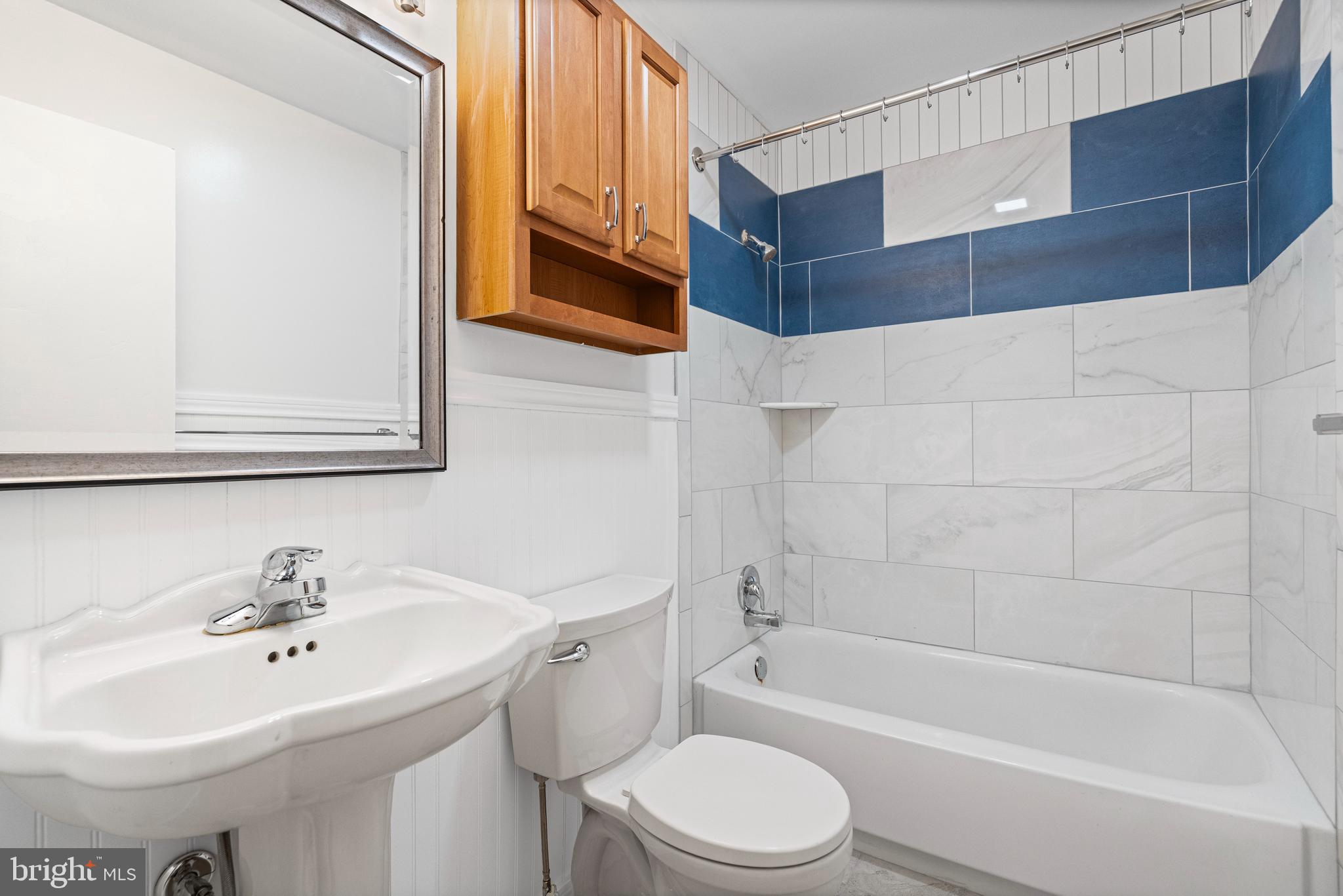 16811 Ridge Road Upperco, MD 21155 - Photo 12 of 22 a bathroom with a sink toilet and shower