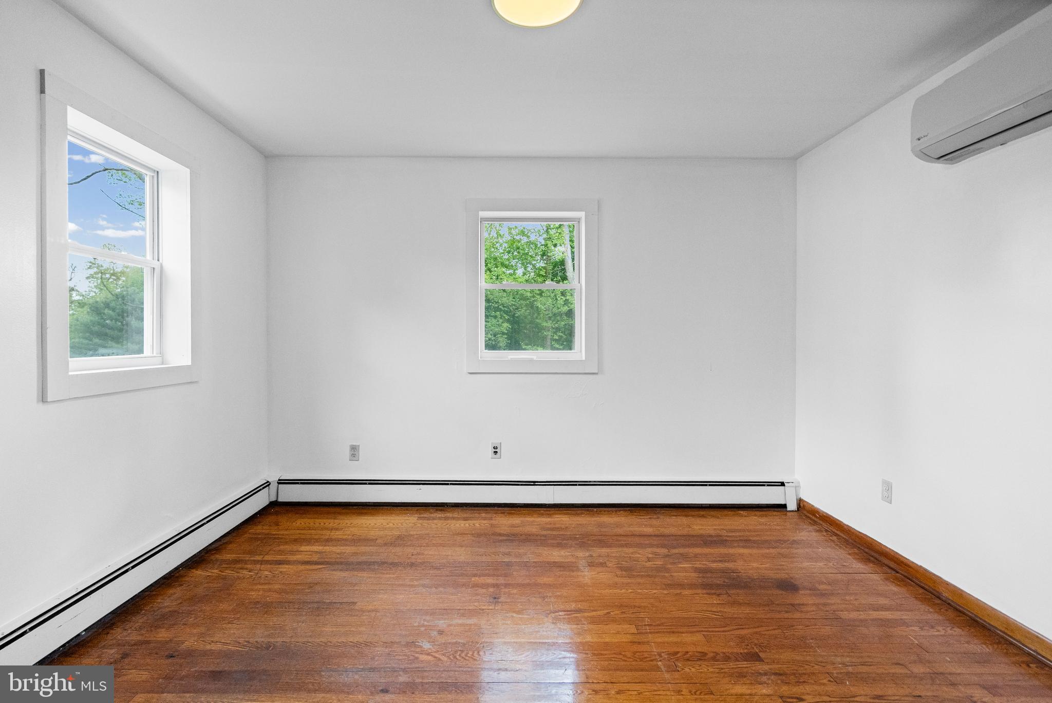 16811 Ridge Road Upperco, MD 21155 - Photo 15 of 22 a view of a room with wooden floor and window