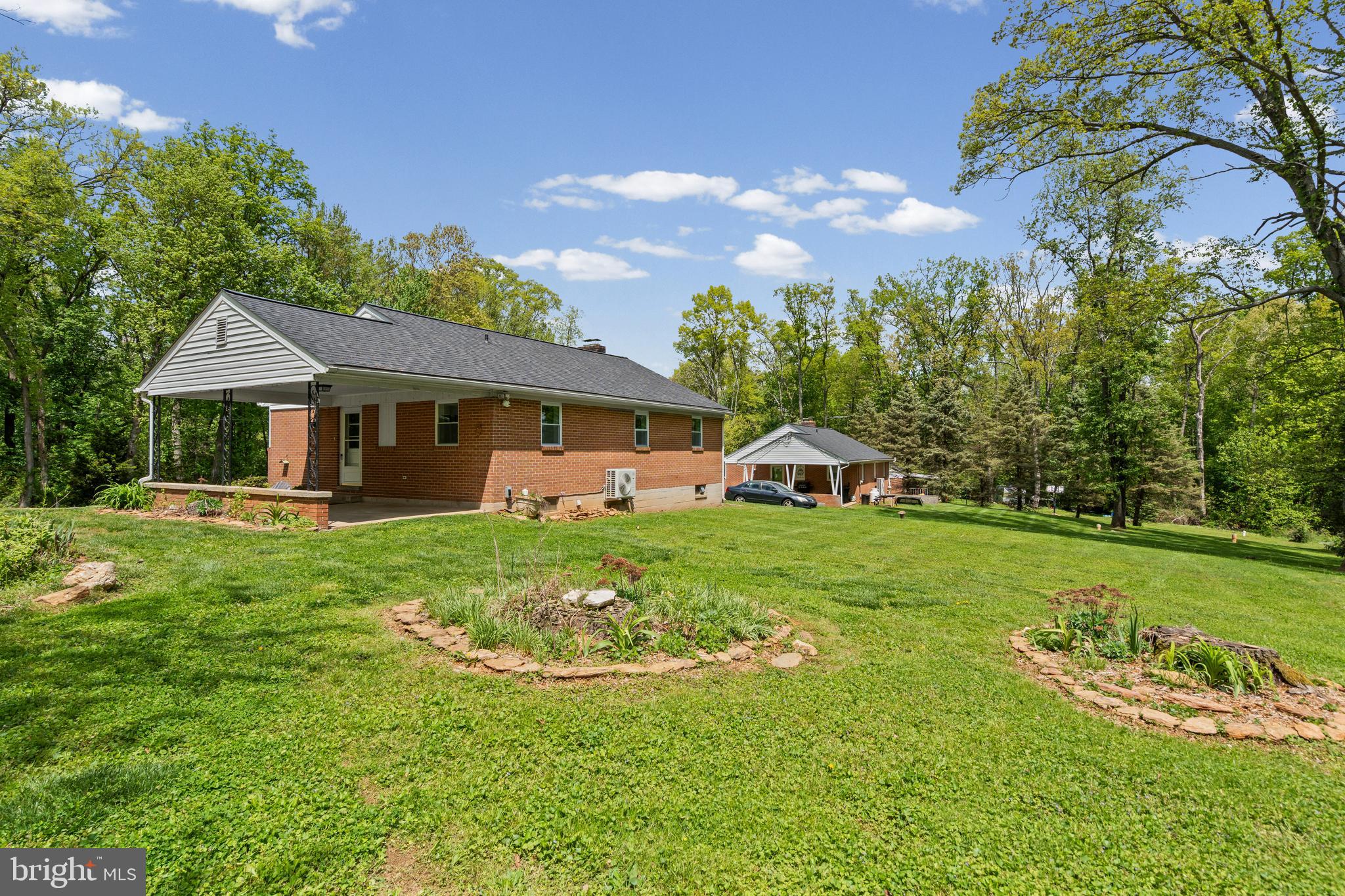16811 Ridge Road Upperco, MD 21155 - Photo 19 of 22 a front view of a house with a yard