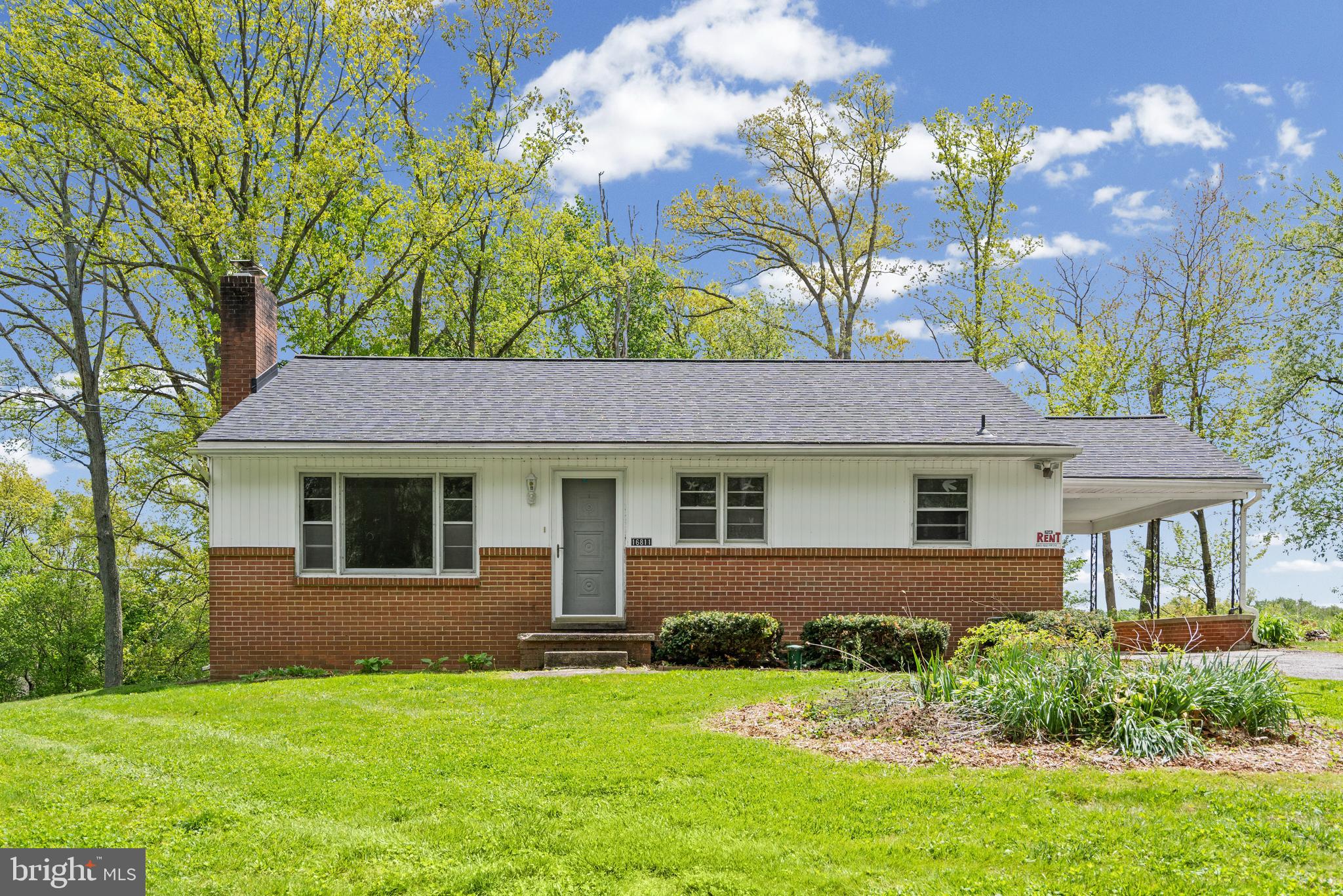 16811 Ridge Road Upperco, MD 21155 - Photo 21 of 22 front view of a house with a yard