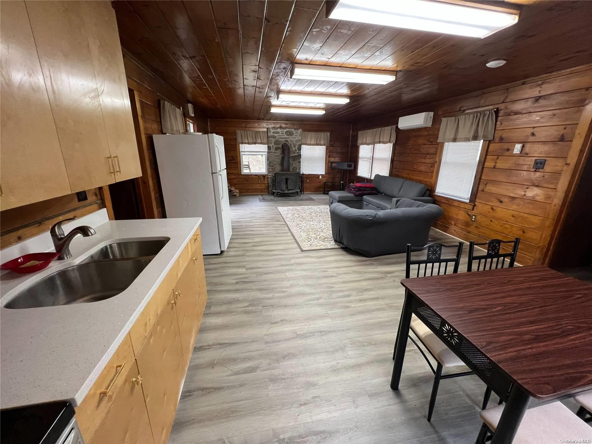 127 Kirkwood Road Stroudsburg, PA 18360 - Photo 11 of 20 a kitchen with sink cabinets and wooden floor