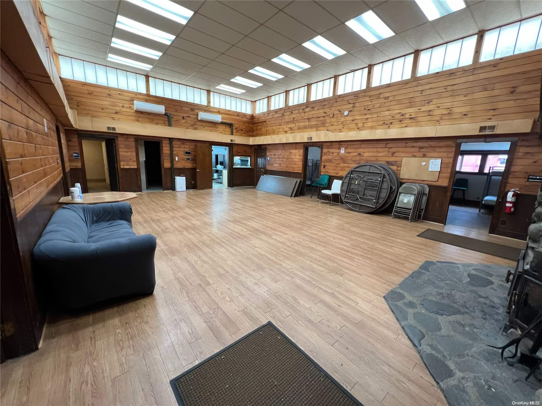 127 Kirkwood Road Stroudsburg, PA 18360 - Photo 15 of 20 a view of a livingroom with furniture and a ceiling fan