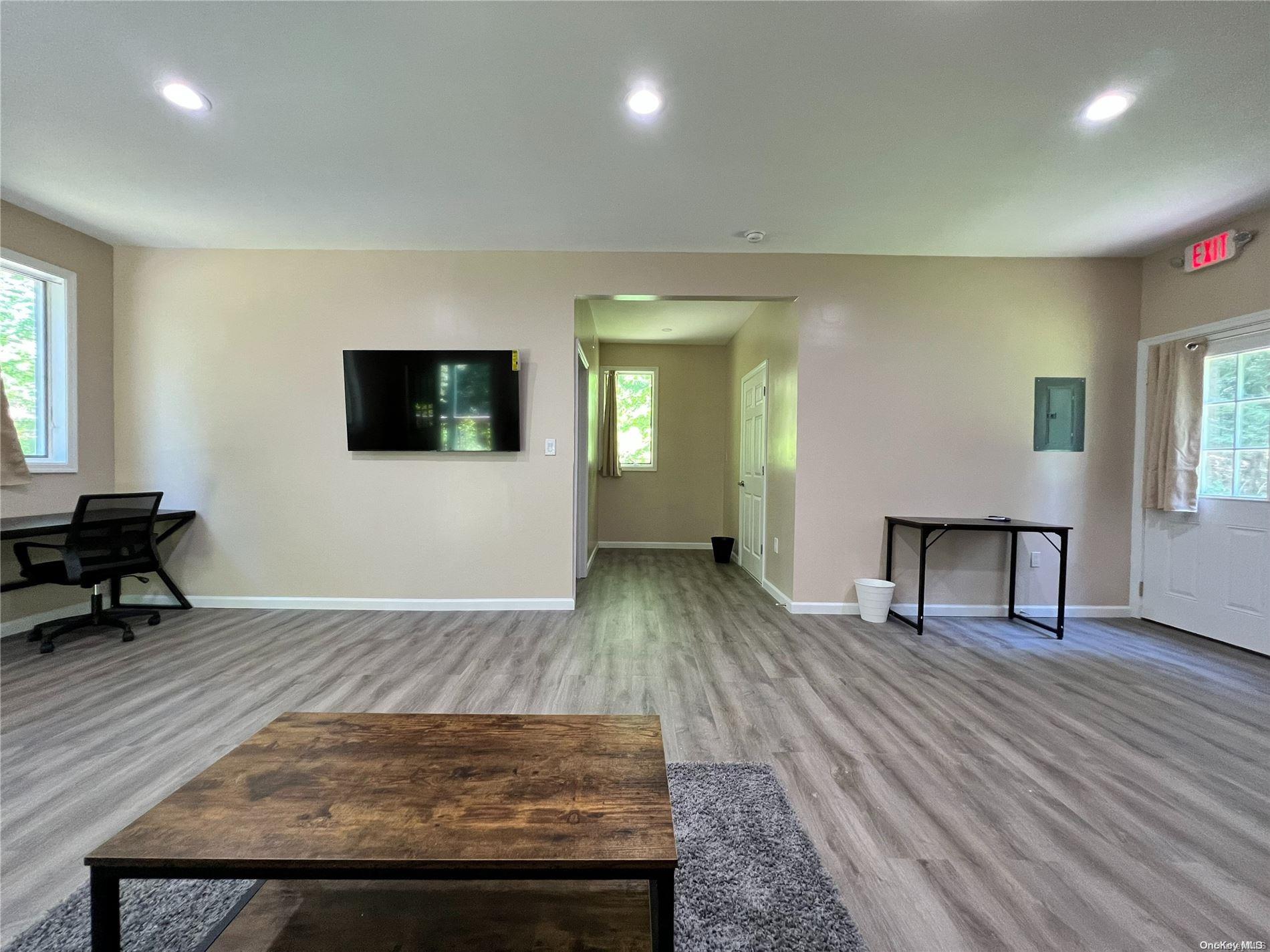 127 Kirkwood Road Stroudsburg, PA 18360 - Photo 5 of 20 a living room with furniture and a flat screen tv