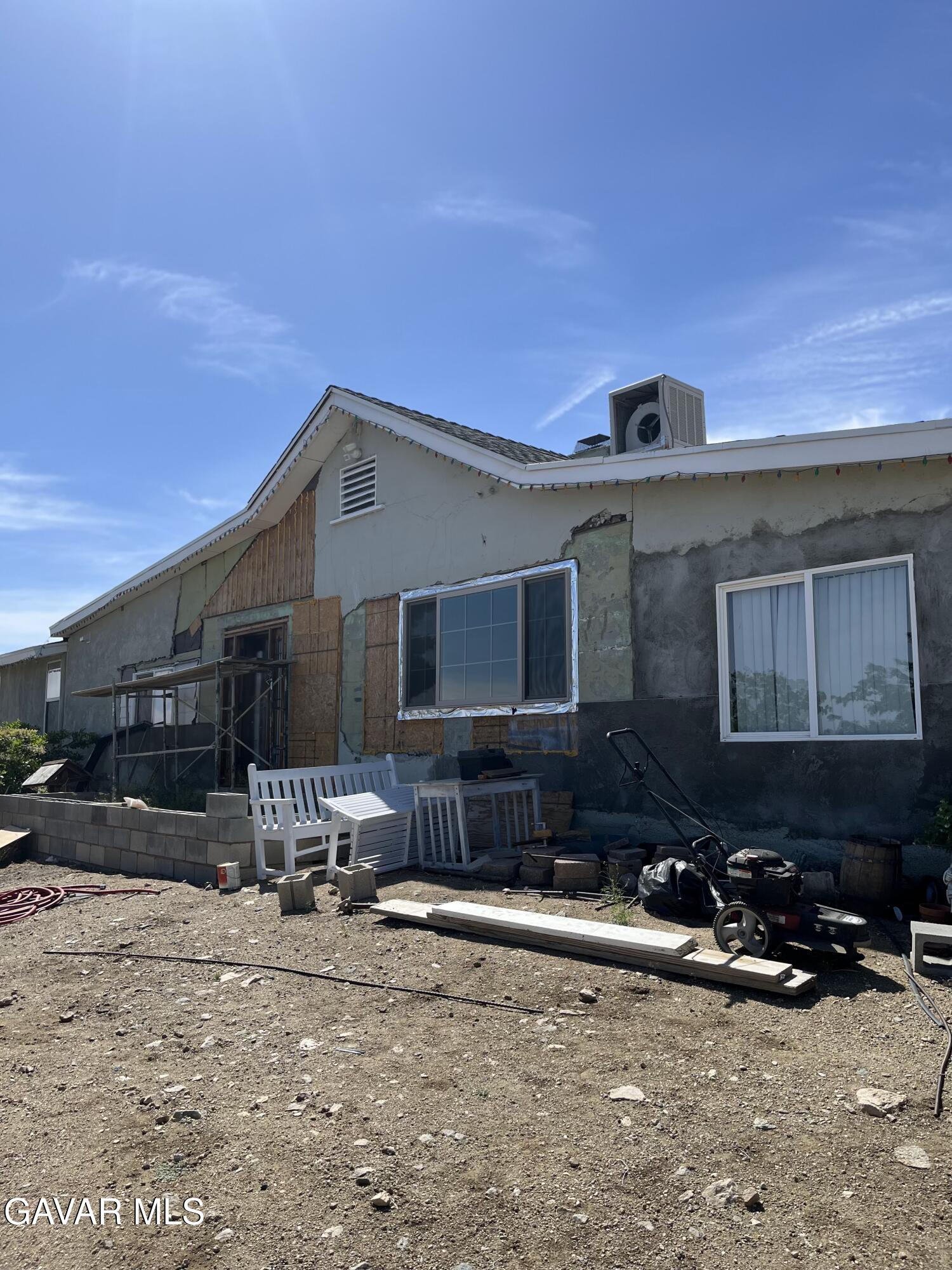 11216 Juniper Mesa Road Littlerock, CA 93543 - Photo 1 of 6 a front view of a house with a yard