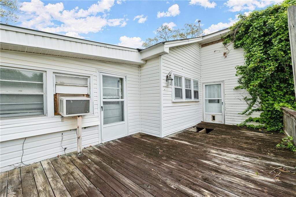 4955 Flat Creek Road Oakwood, GA 30566 - Photo 14 of 37 a front view of a house with a yard