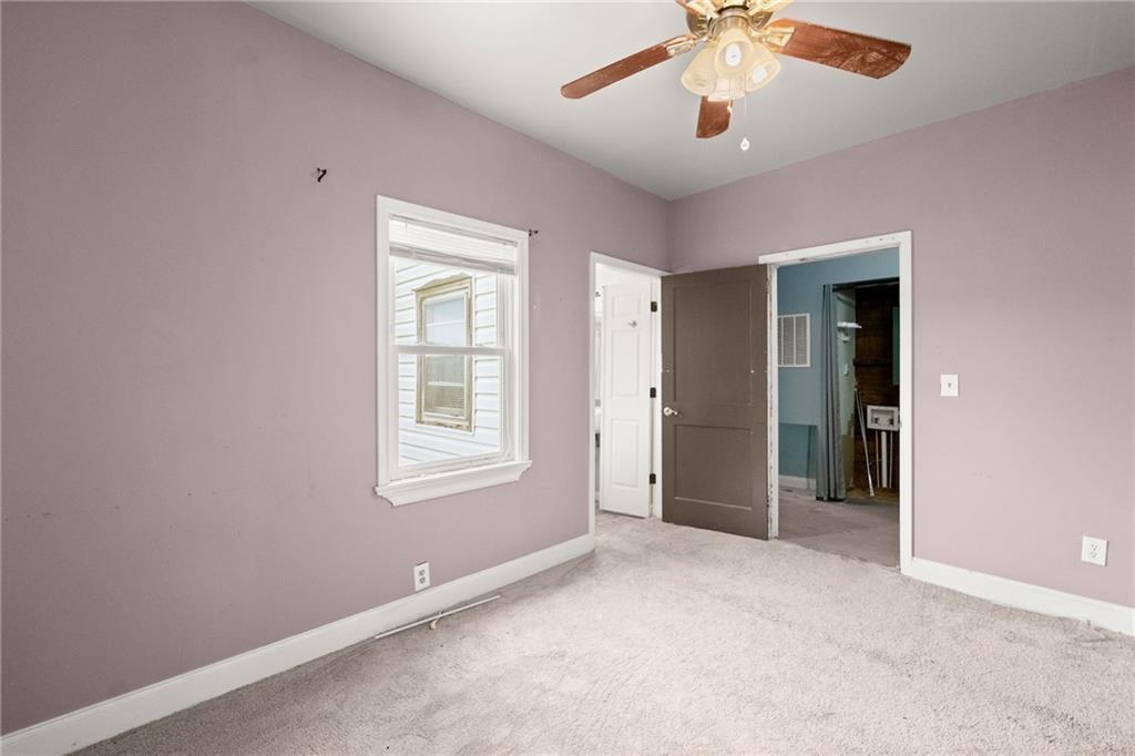 4955 Flat Creek Road Oakwood, GA 30566 - Photo 31 of 37 a view of an empty room with a window