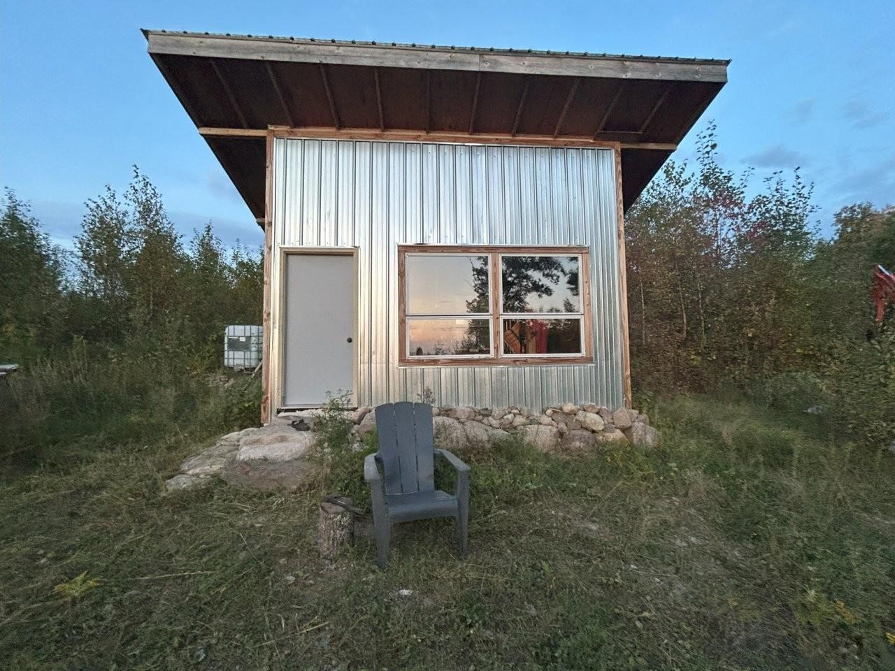 135 Biwabik Mn 55708 Embarrass, MN 55732 - Photo 11 of 42 All metal exterior & widely cleared building site for wildfire protection