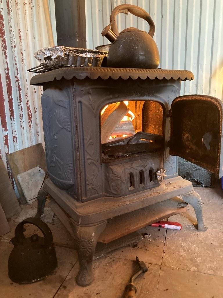 135 Biwabik Mn 55708 Embarrass, MN 55732 - Photo 20 of 42 Wood stove provides heat & hot meals