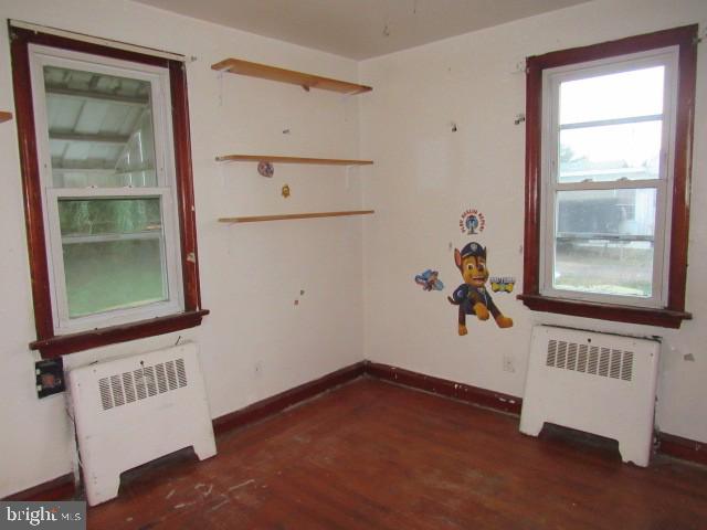 16 Spring Street Bridgeton, NJ 08302 - Photo 6 of 9 a view of an entryway with wooden floor
