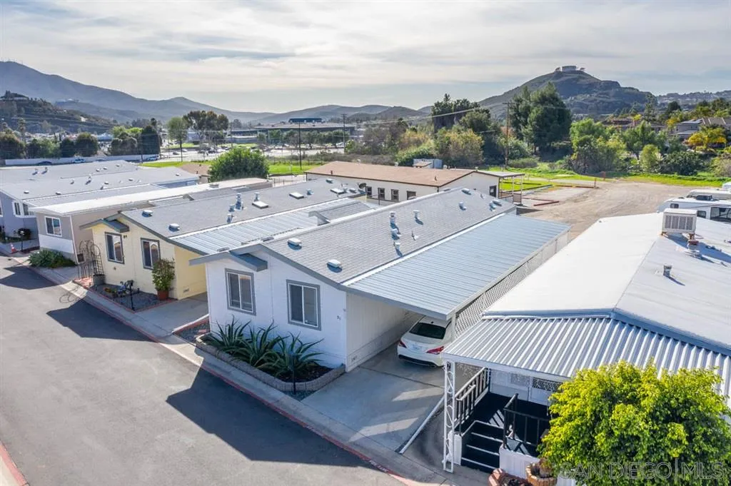1810 Hillsdale Road, Unit 85 El Cajon, CA 92019 - Photo 2 of 23 an aerial view of a house with a garden
