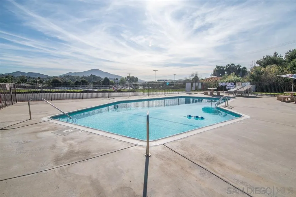 1810 Hillsdale Road, Unit 85 El Cajon, CA 92019 - Photo 21 of 23 a swimming pool with a back yard
