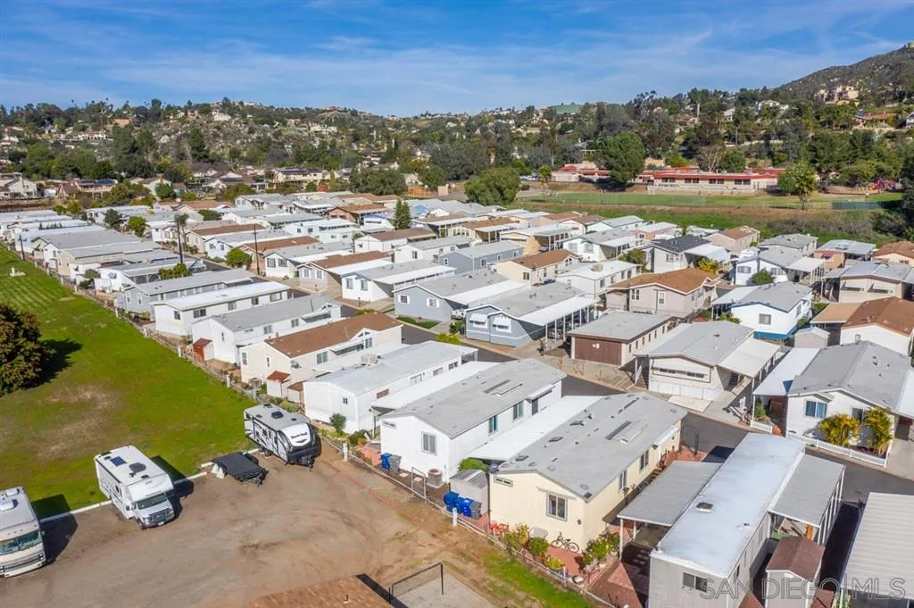 1810 Hillsdale Road, Unit 85 El Cajon, CA 92019 - Photo 22 of 23 an aerial view of a city with lots of residential buildings lake and ocean view