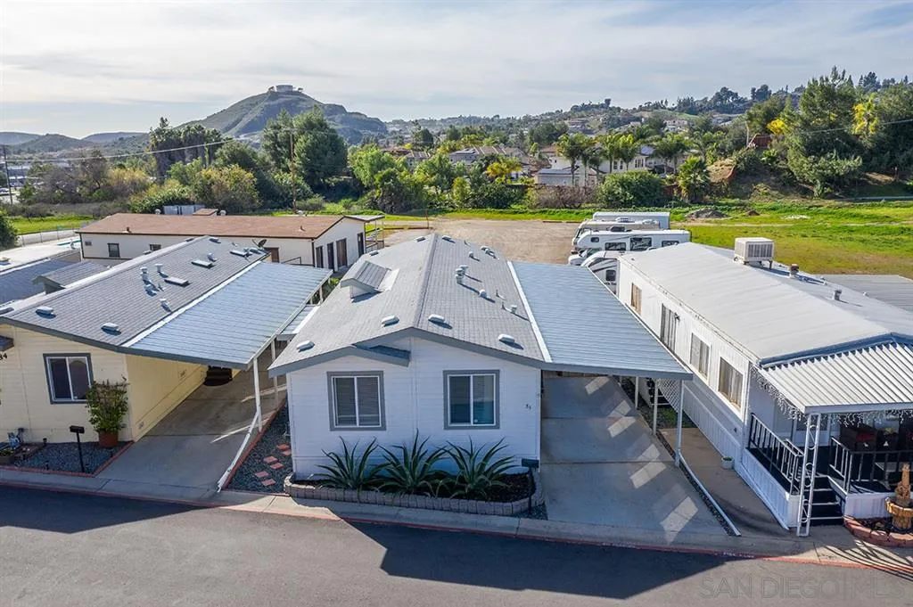 1810 Hillsdale Road, Unit 85 El Cajon, CA 92019 - Photo 4 of 23 an aerial view of a house with a yard swimming pool and outdoor seating