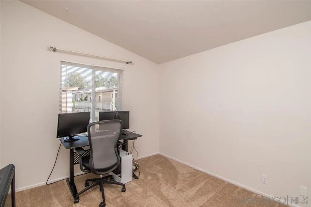 1810 Hillsdale Road, Unit 85 El Cajon, CA 92019 - Photo 5 of 23 a workspace with furniture and a window