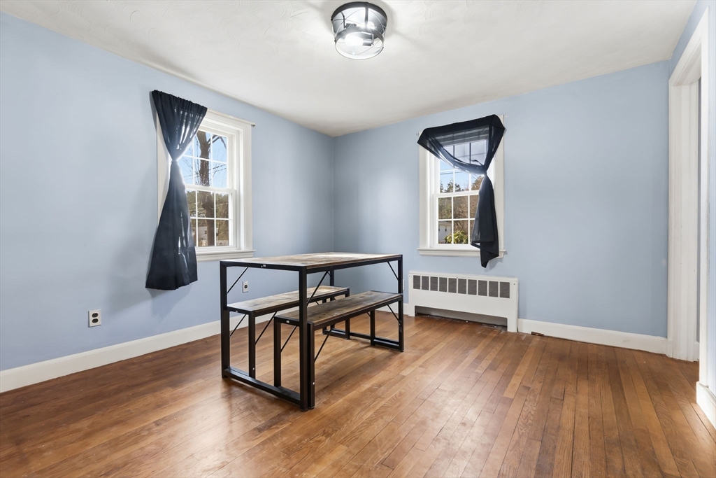 287 Main Street Saugus, MA 01906 - Photo 13 of 24 a view of a livingroom with furniture and hardwood floor