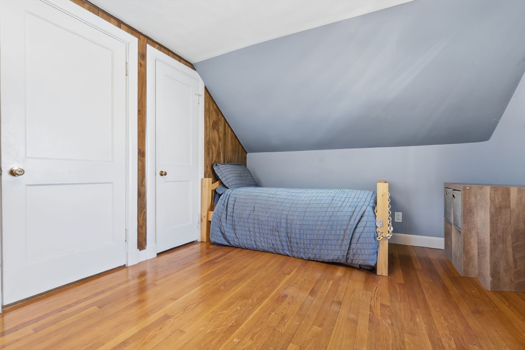 287 Main Street Saugus, MA 01906 - Photo 20 of 24 a view of an empty room with wooden floor
