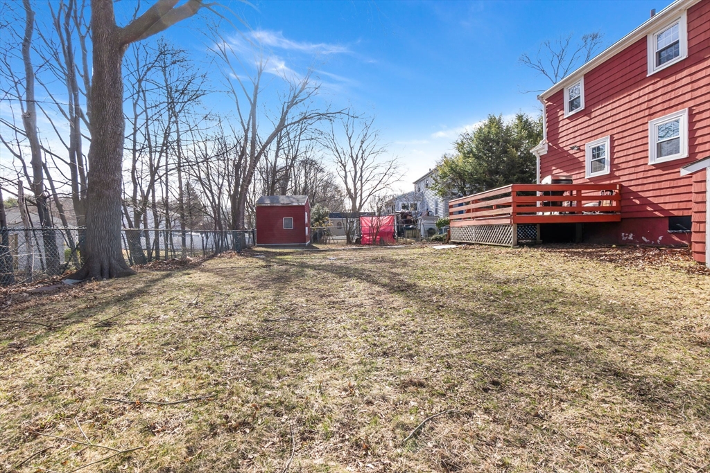 287 Main Street Saugus, MA 01906 - Photo 24 of 24 a view of a house with a yard and sitting area